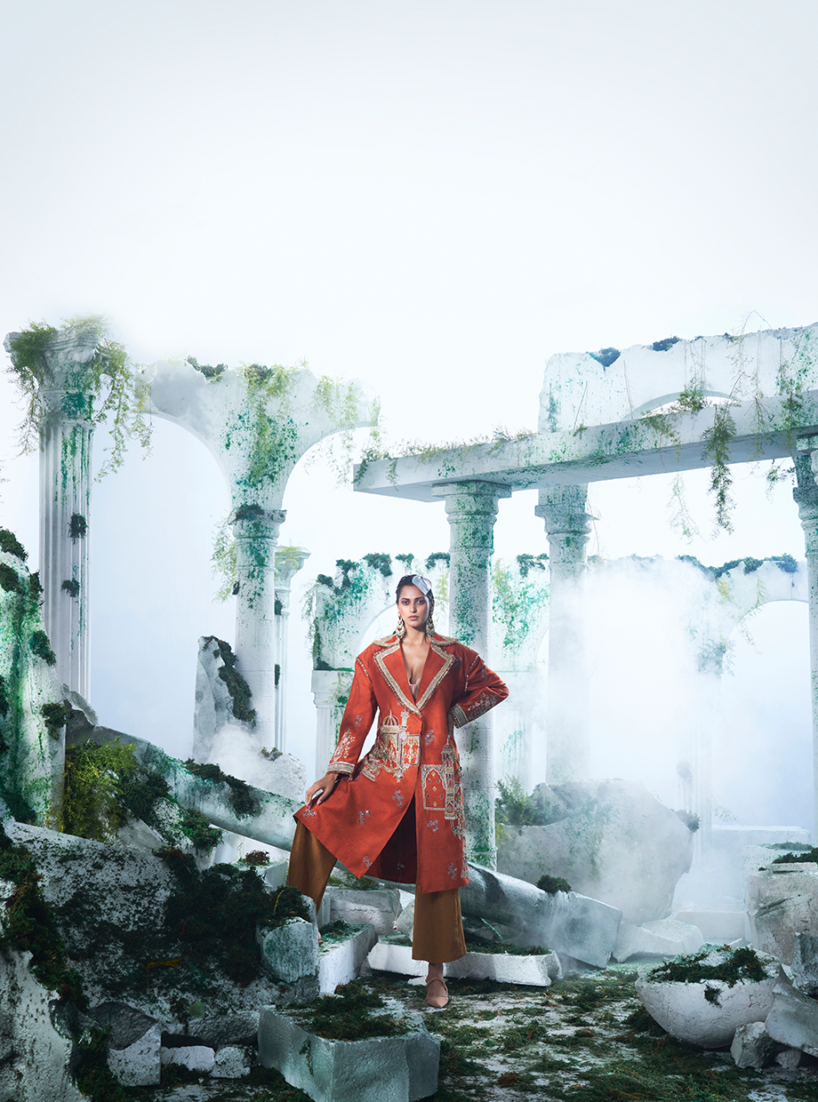Rust Orange Trench Coat Paired With Corset Top Inside  And Pure Dupian Flared Pant - Ankush Jain