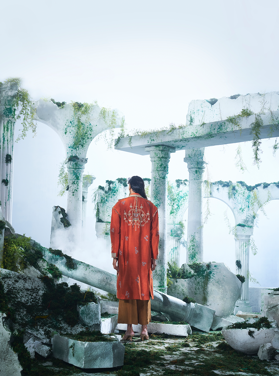 Rust Orange Trench Coat Paired With Corset Top Inside  And Pure Dupian Flared Pant - Ankush Jain