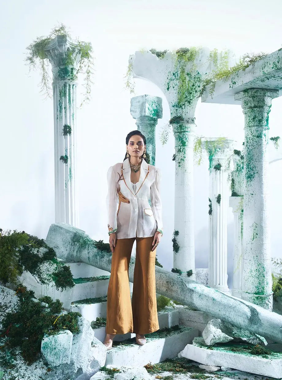 White Blazer With Big Embroidered Deer Paired With Pure Dupian Flared Pant - Ankush Jain